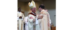 Archbishop Etienne gives thanks for a new priest, a new pallium and a new home