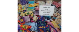 Catholic Native Ministry members  provide masks to those in need