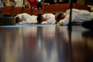 Archbishop ordains four men as deacons of the archdiocese