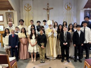 Many more parishioners receive the sacrament of confirmation